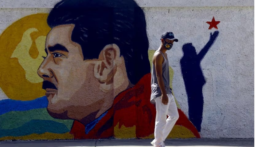 Mural de Nicolás Maduro em uma rua da cidade de Guacara, no norte da Venezuela, em 2 de dezembro